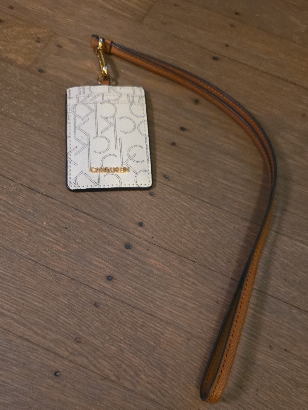 Calvin Klein Cream Monogram Card Holder with Tan Wristlet and Gold Accents